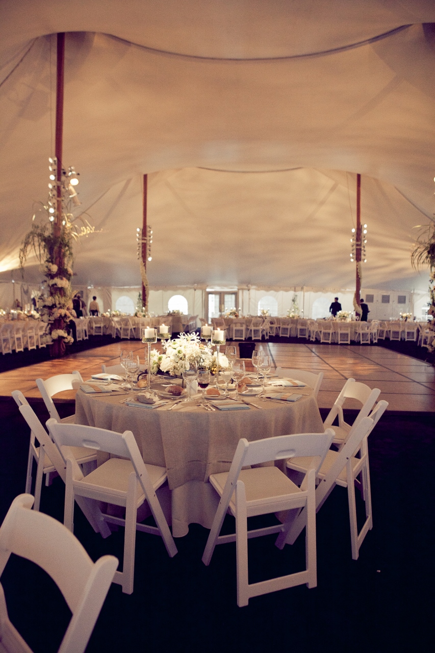 White padded chairs and round table