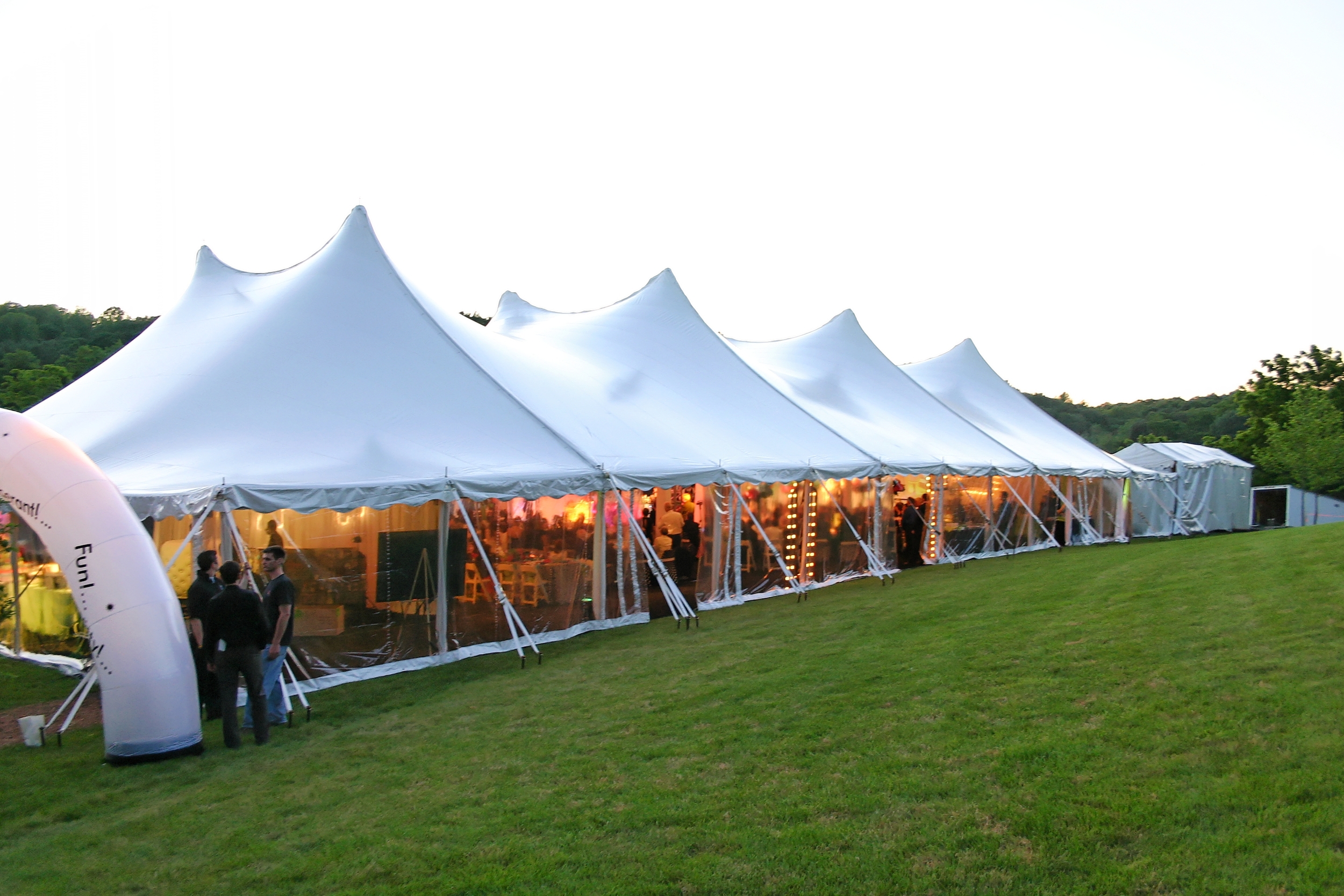 Large white tent with clear window sidewalls for rent in King of Prussia, PA