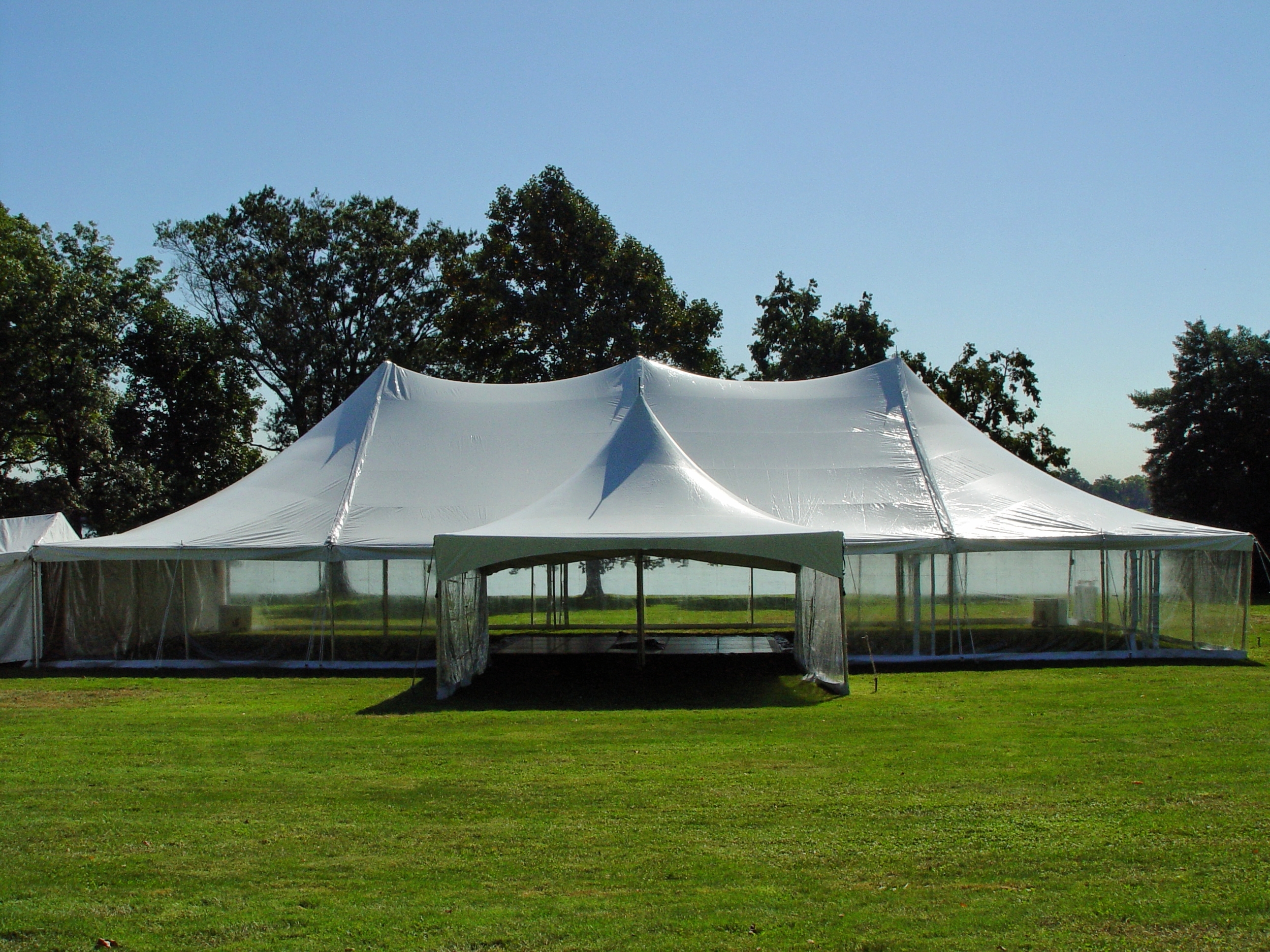 White tents with clear walls