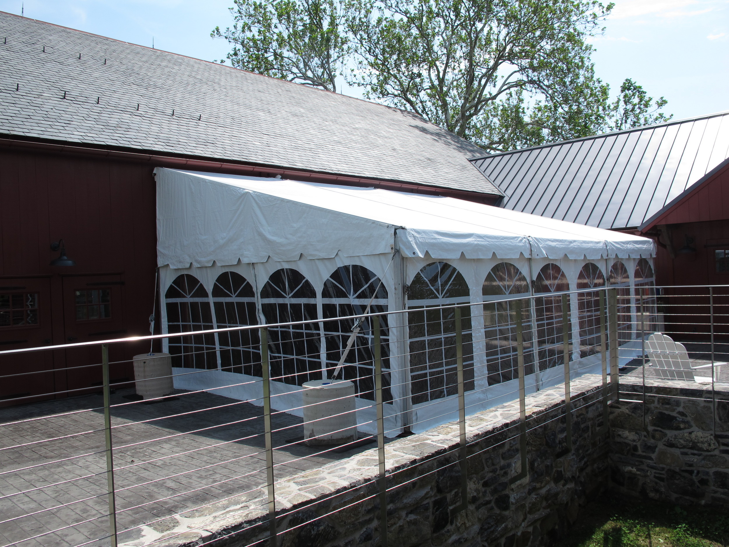 Single slope pavilion tent for barn wedding