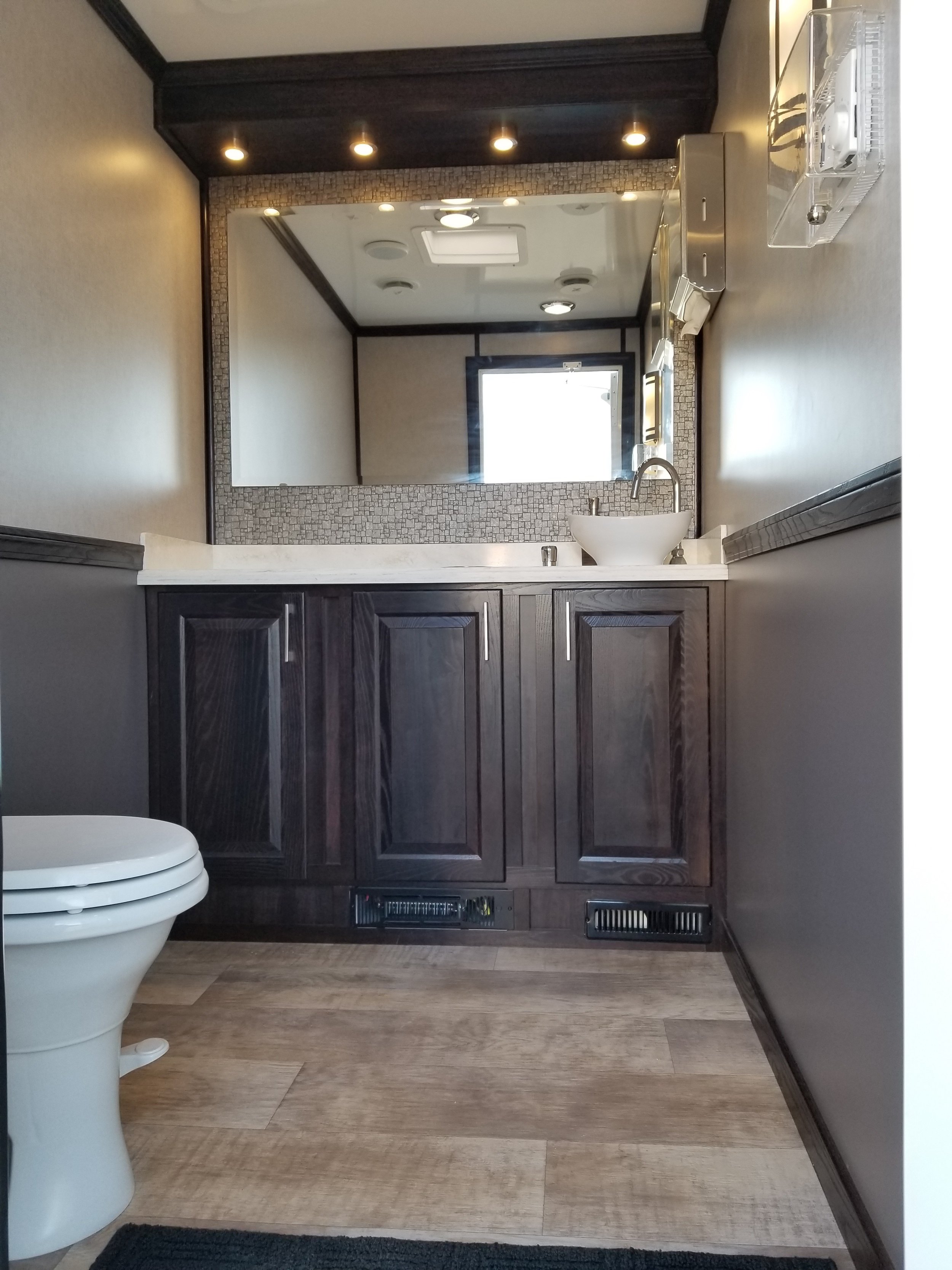 Women's side of 2 person portable restroom trailer