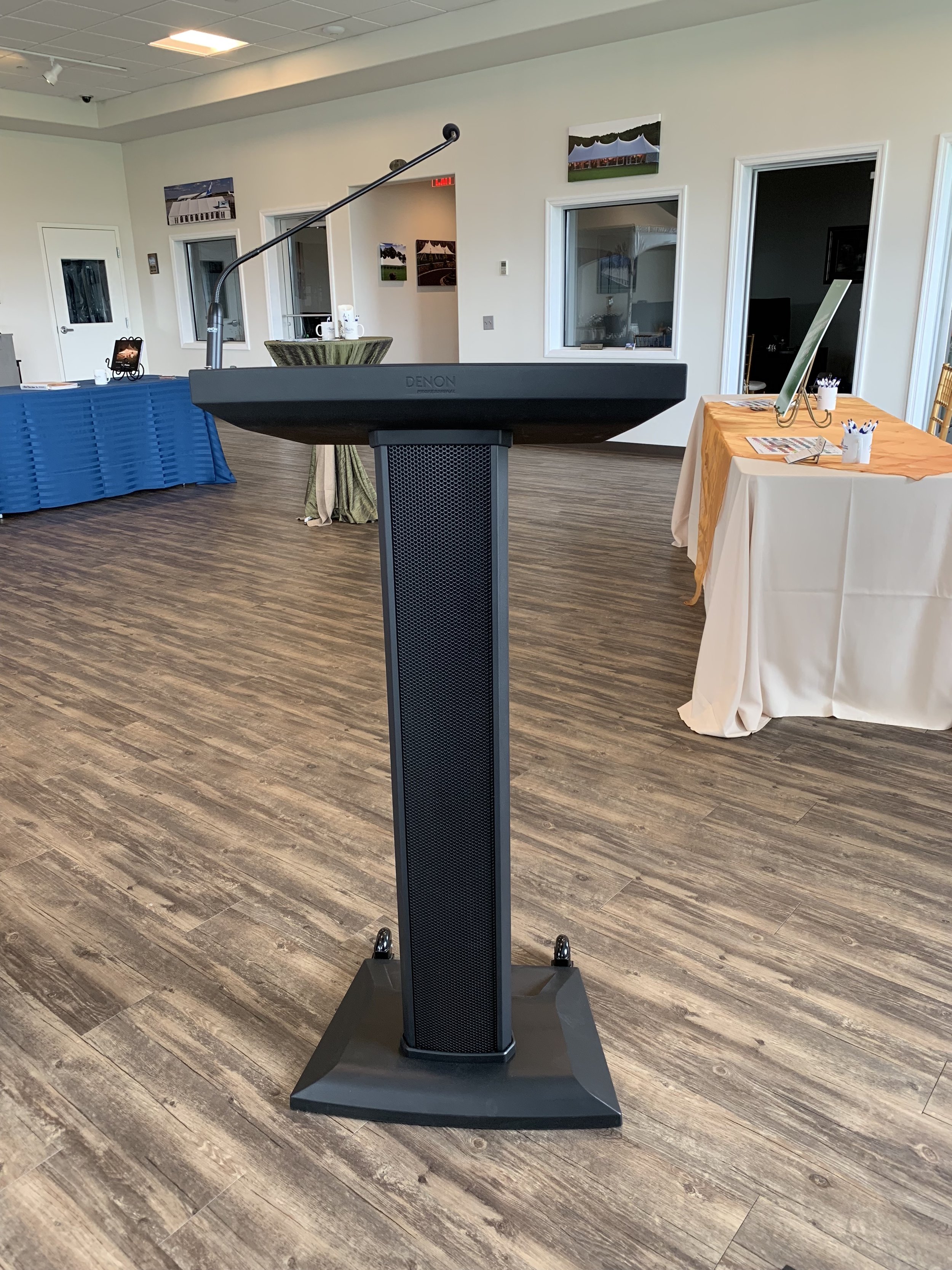 Portable podium with speaker