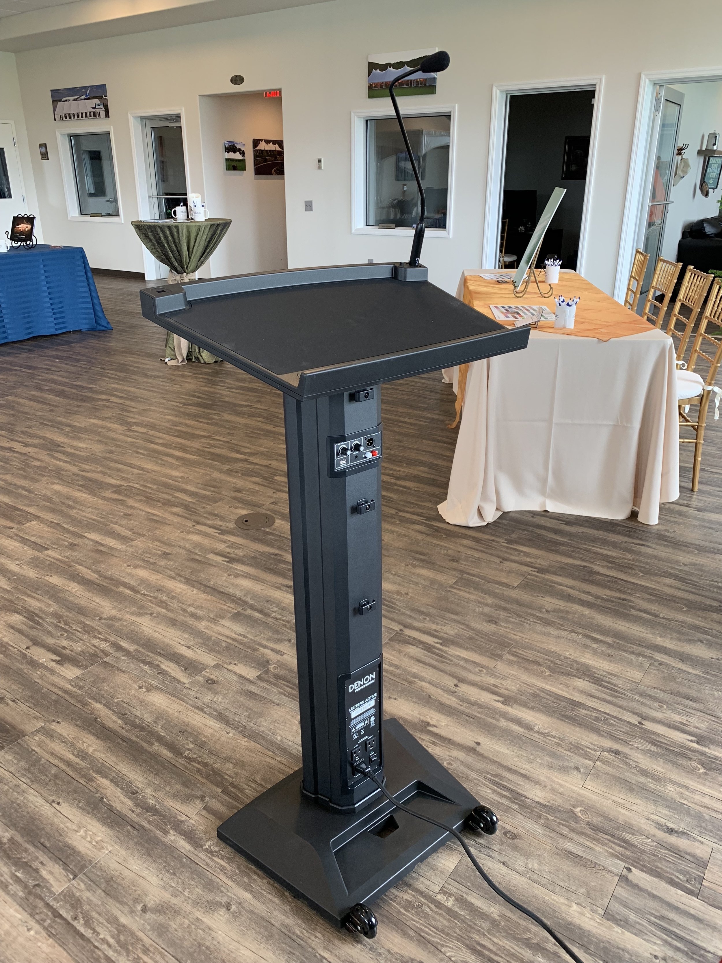 Portable podium with speaker