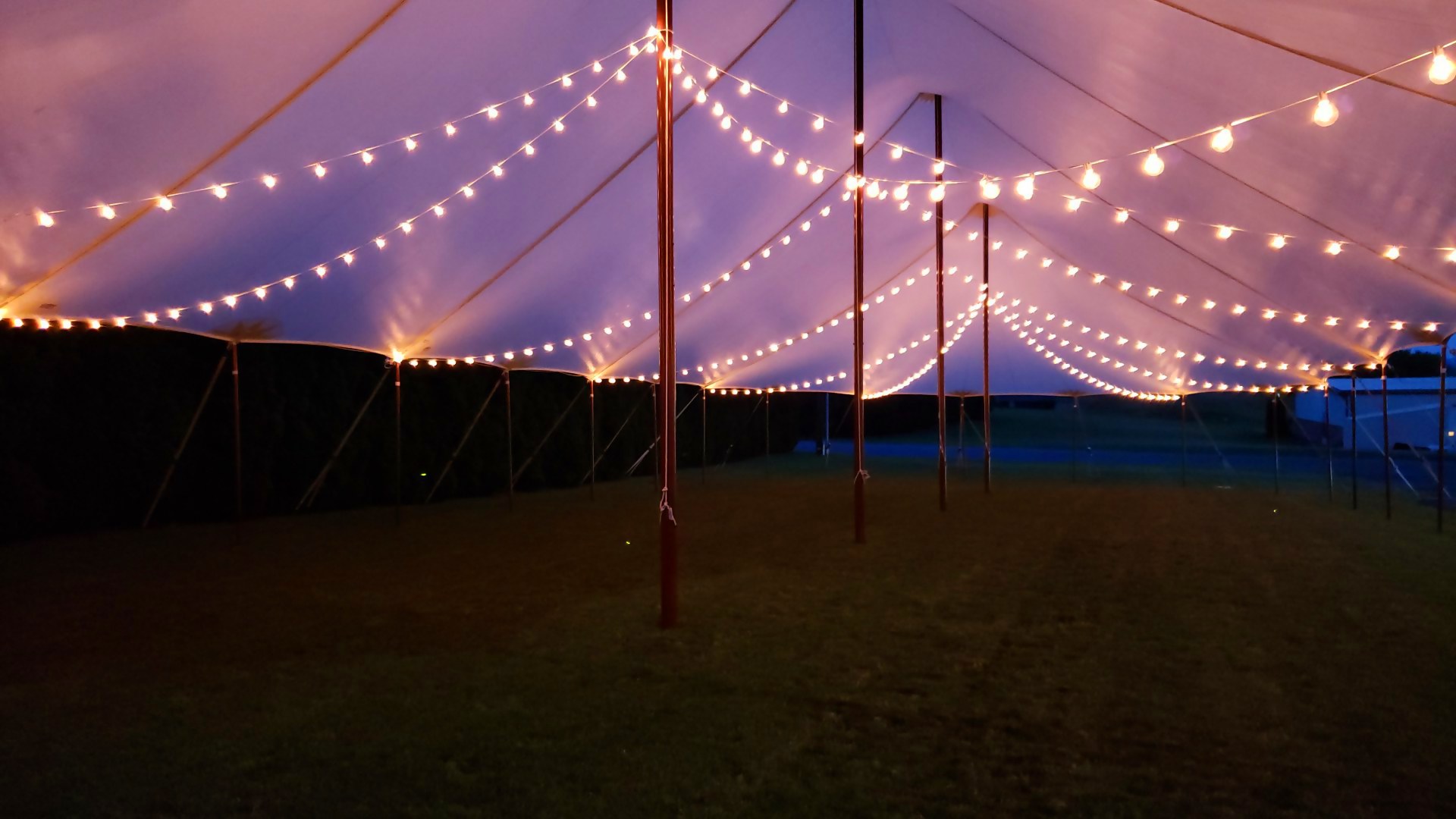 Cafe lights in a sailcloth tent