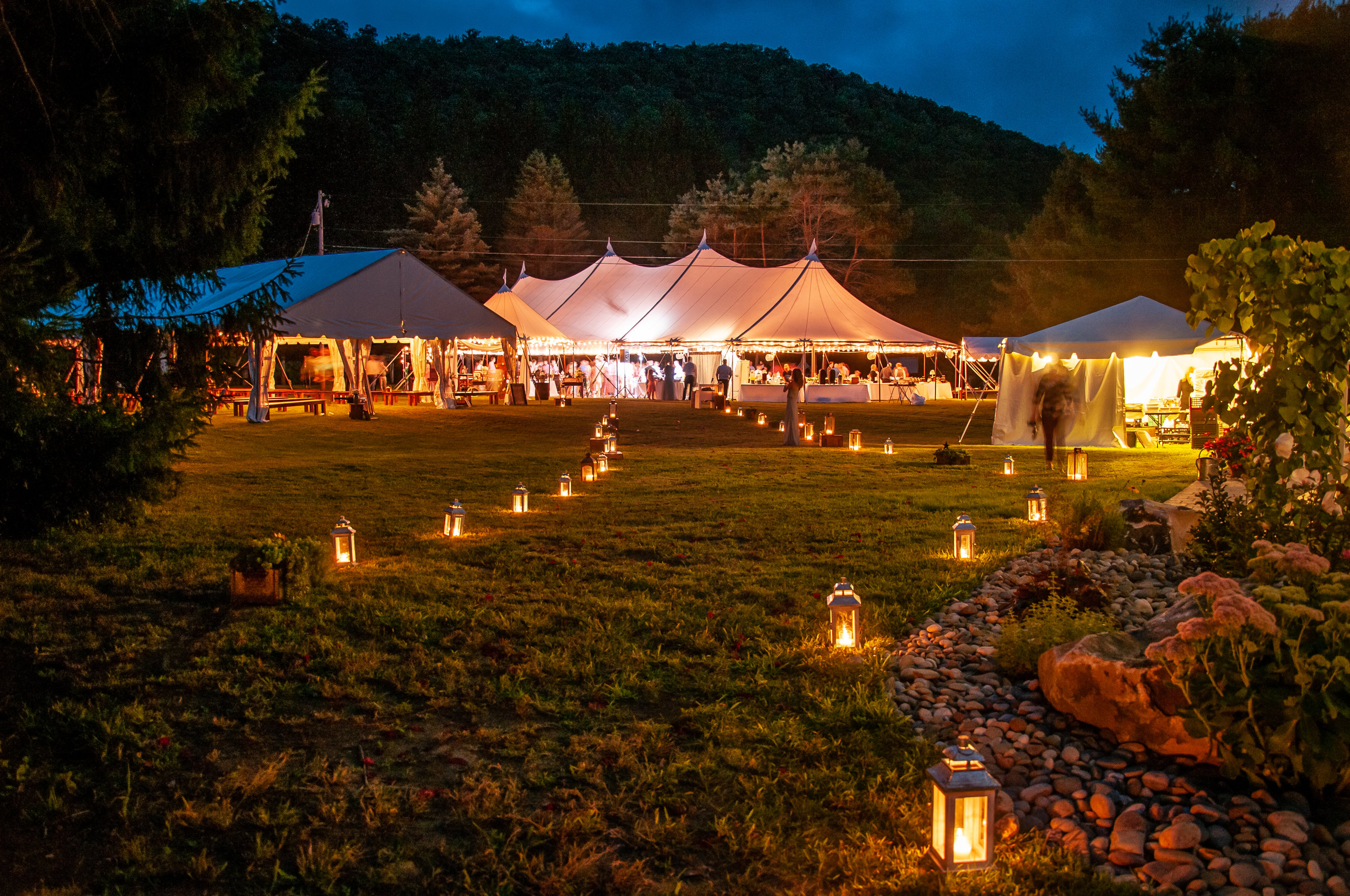 Outdoor wedding in a rustic sailcloth tent