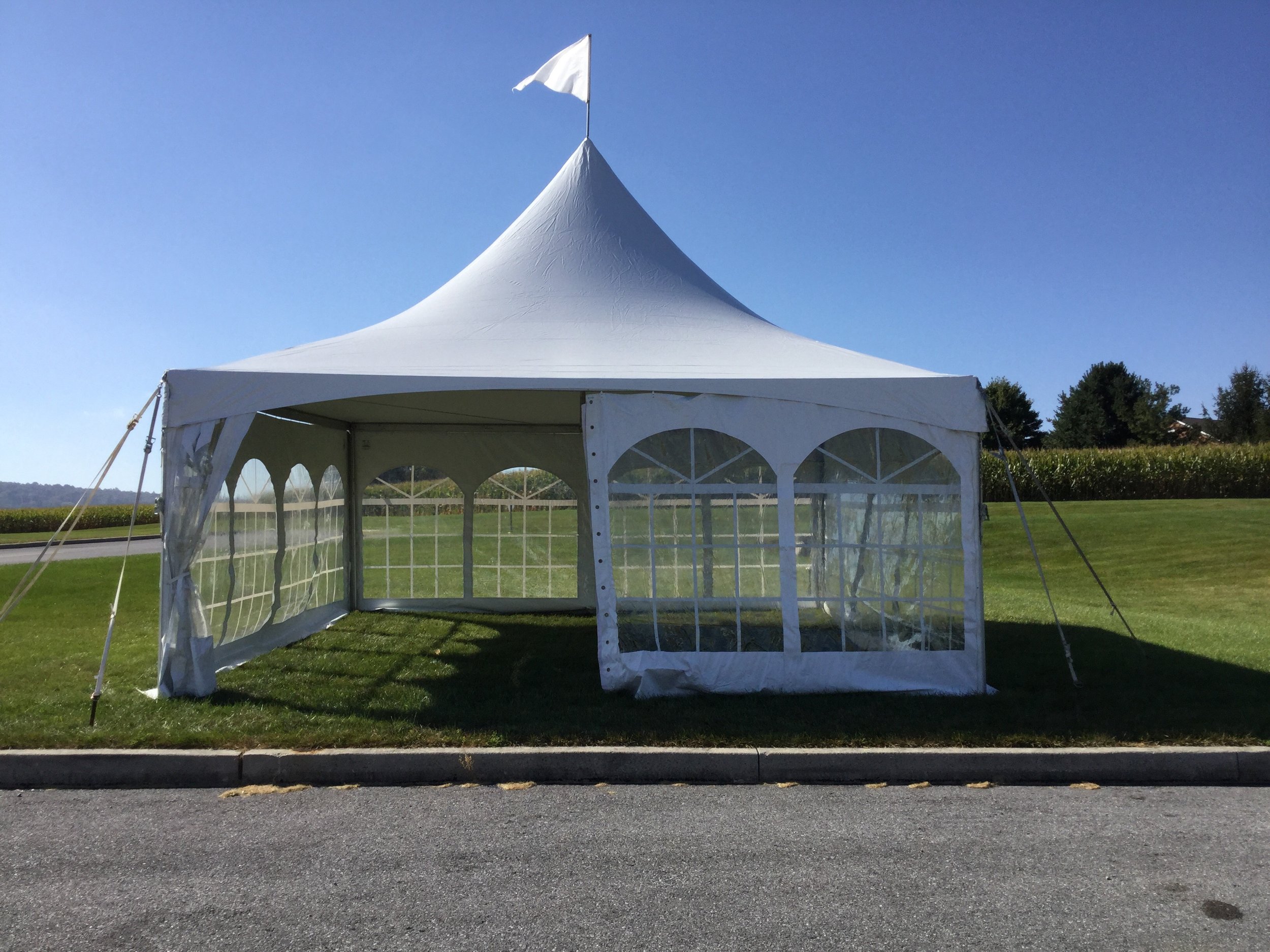 Beautiful White frame tent with cathedral window sidewalls for rent in Myerstown, PA