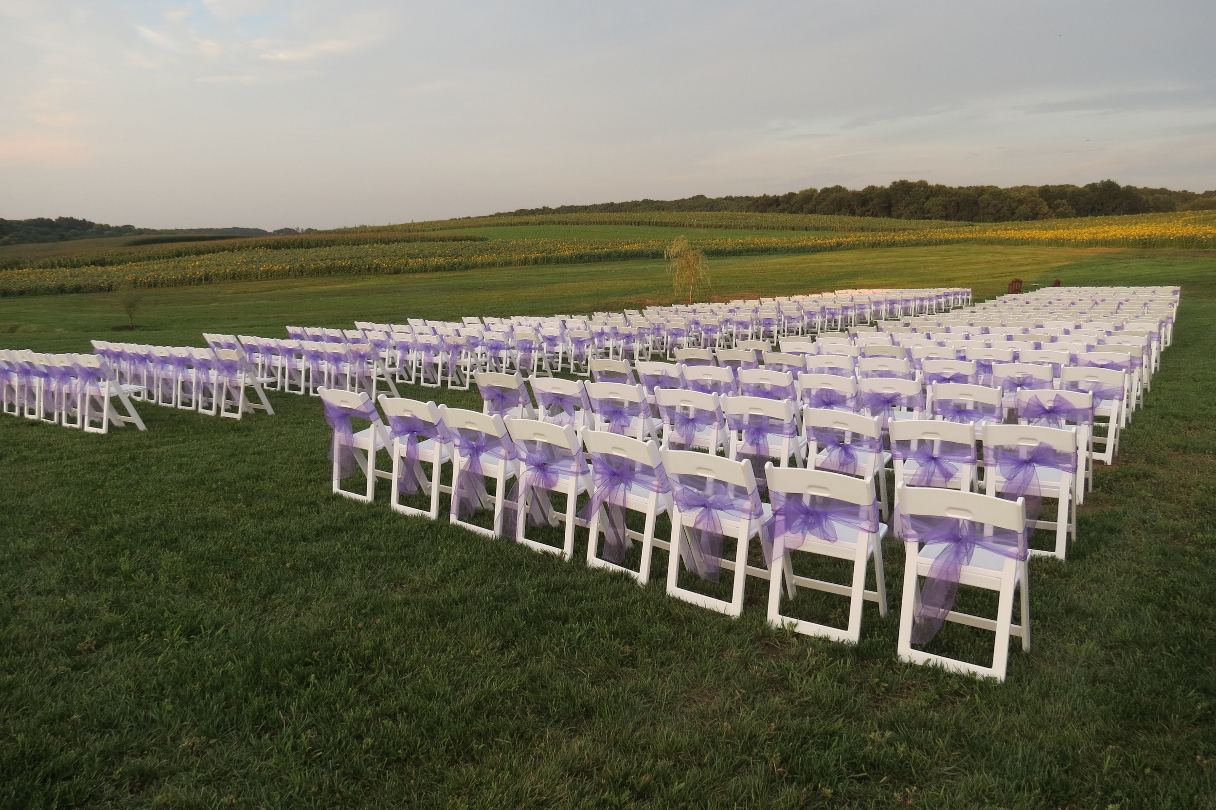 Beautiful white folding garden chairs for rent in Ocean City, MD