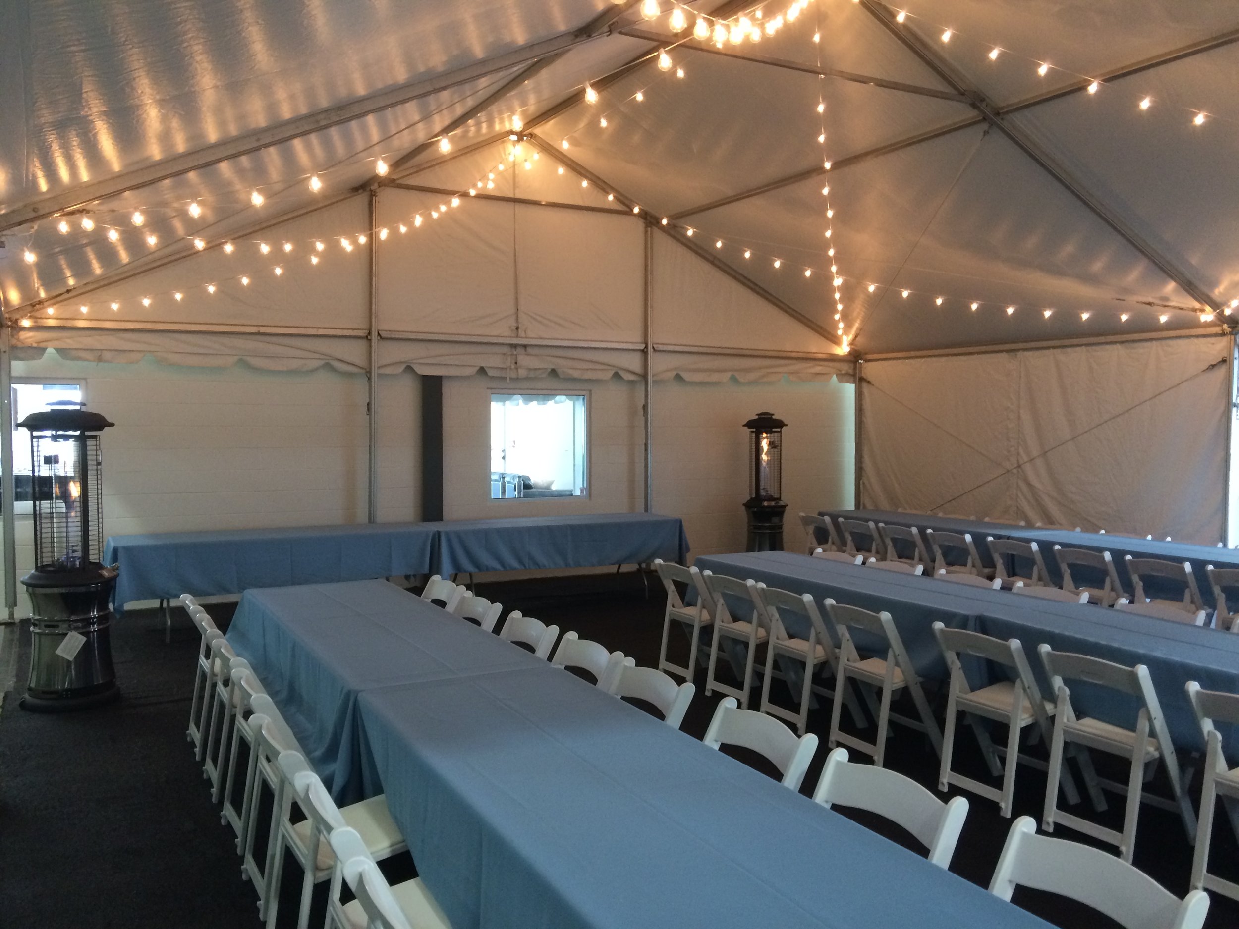 Frame tents, cafe lighting, heaters, tables and chairs to rent for your tent wedding