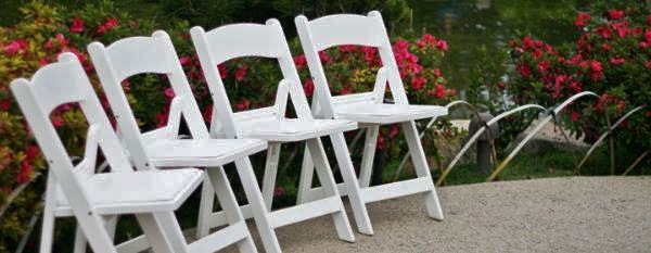 Beautiful white padded chairs to rent for your outdoor wedding