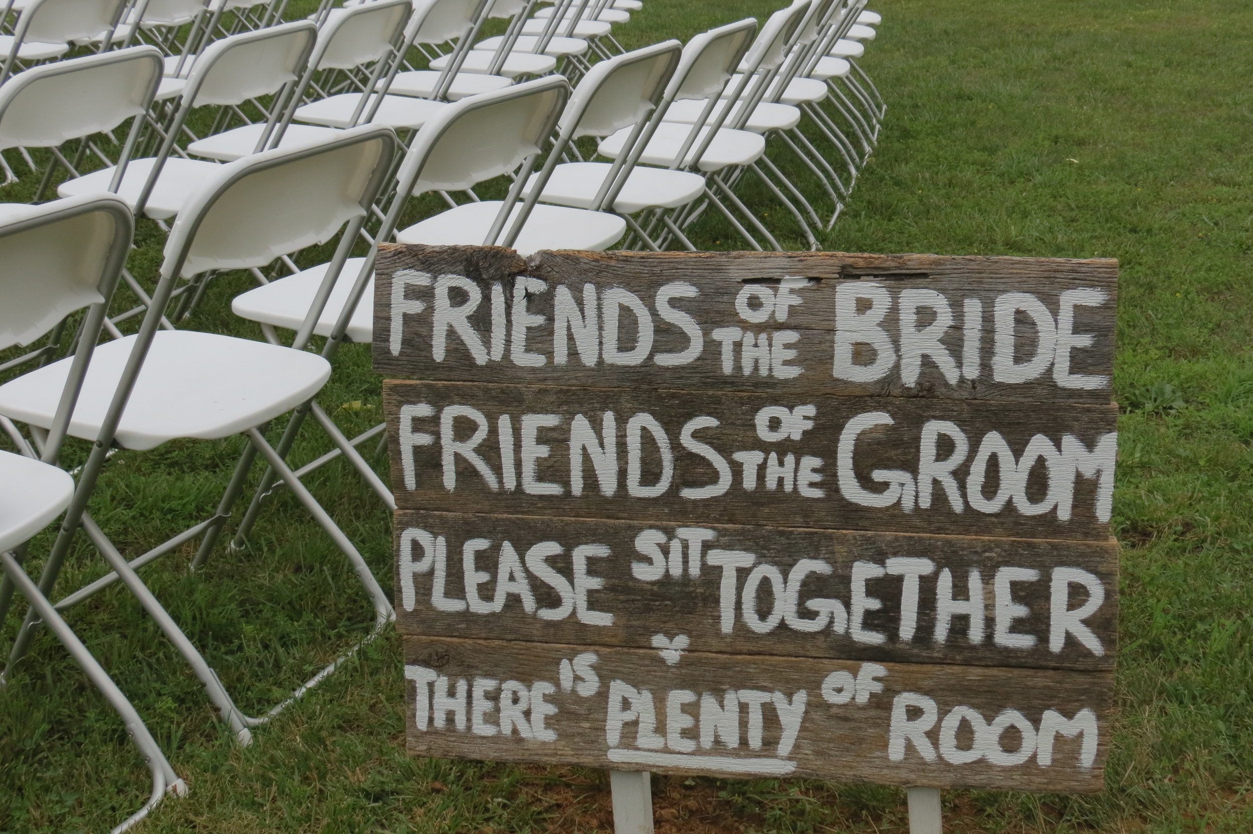 White folding chairs for your outdoor ceremony