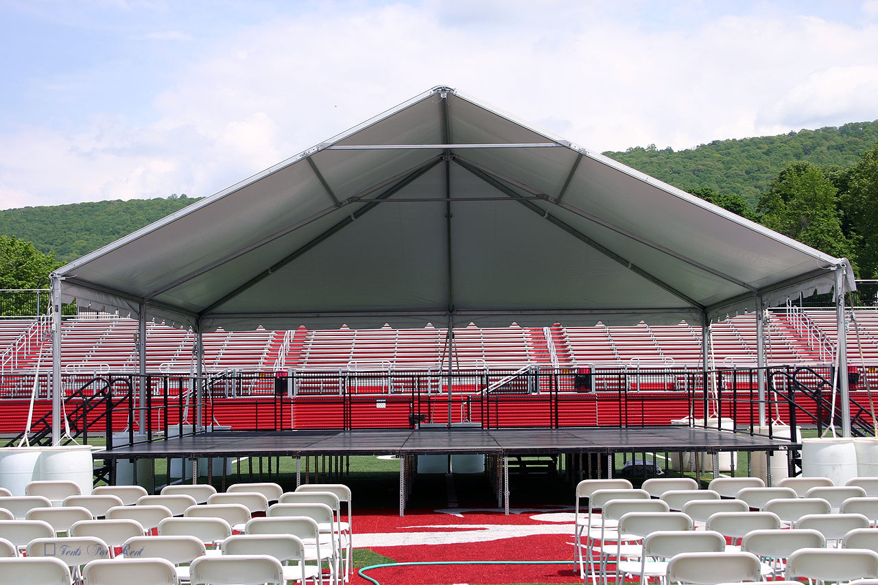 Outdoor college commencement stage and tent