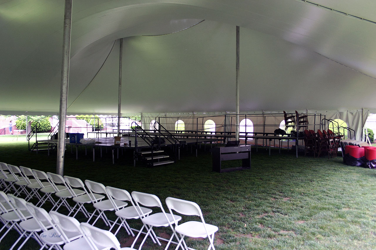 College graduation chairs, stage and tent