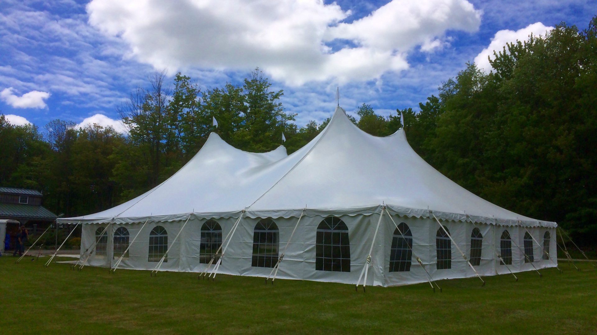 Large white tent with cathedral window sidewalls for rent in Coatesville, PA