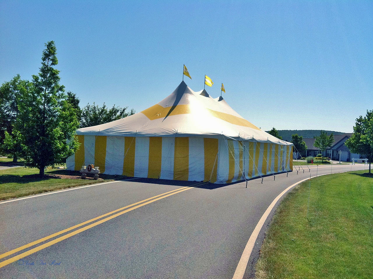 Nice yellow party tent with matching sidewalls for rent in Chambersburg, PA