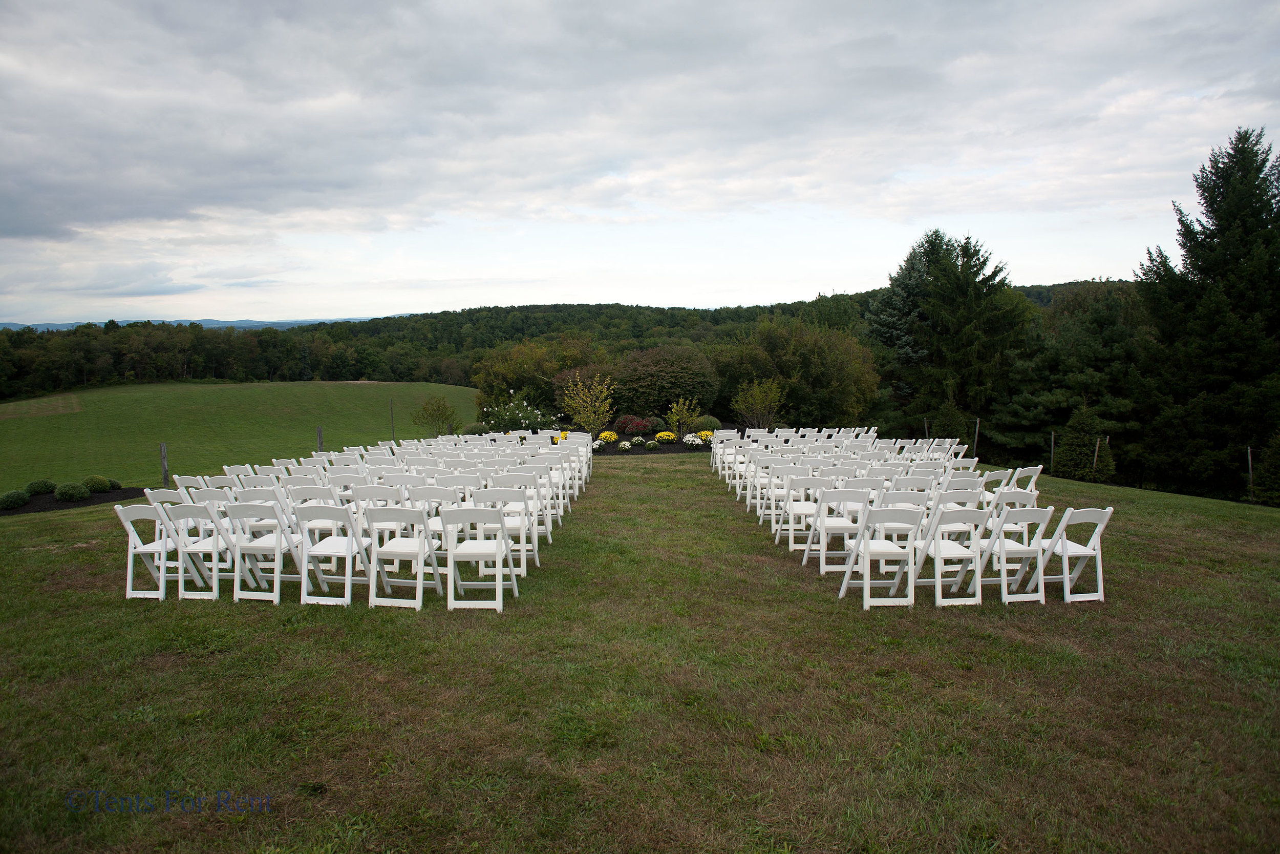 Comfortable white padded garden chairs for rent in Kennett Square, PA