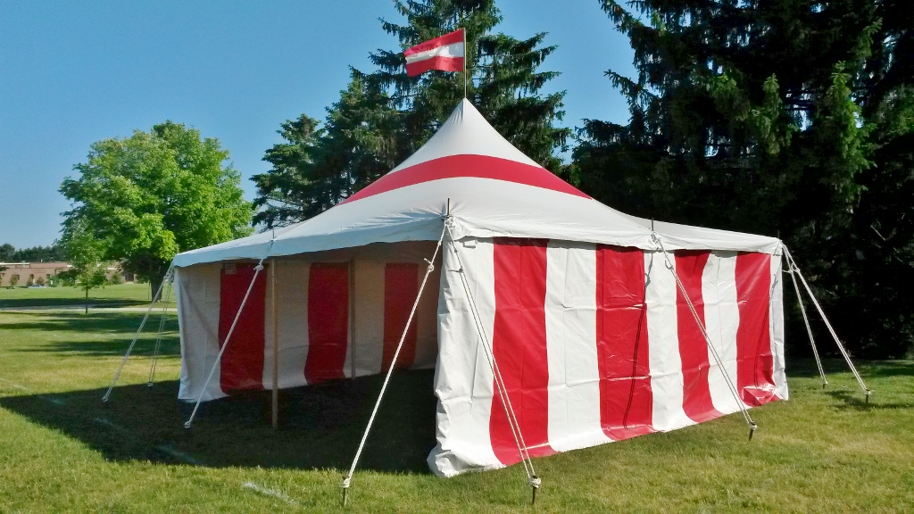 Red and white striped party pole tent