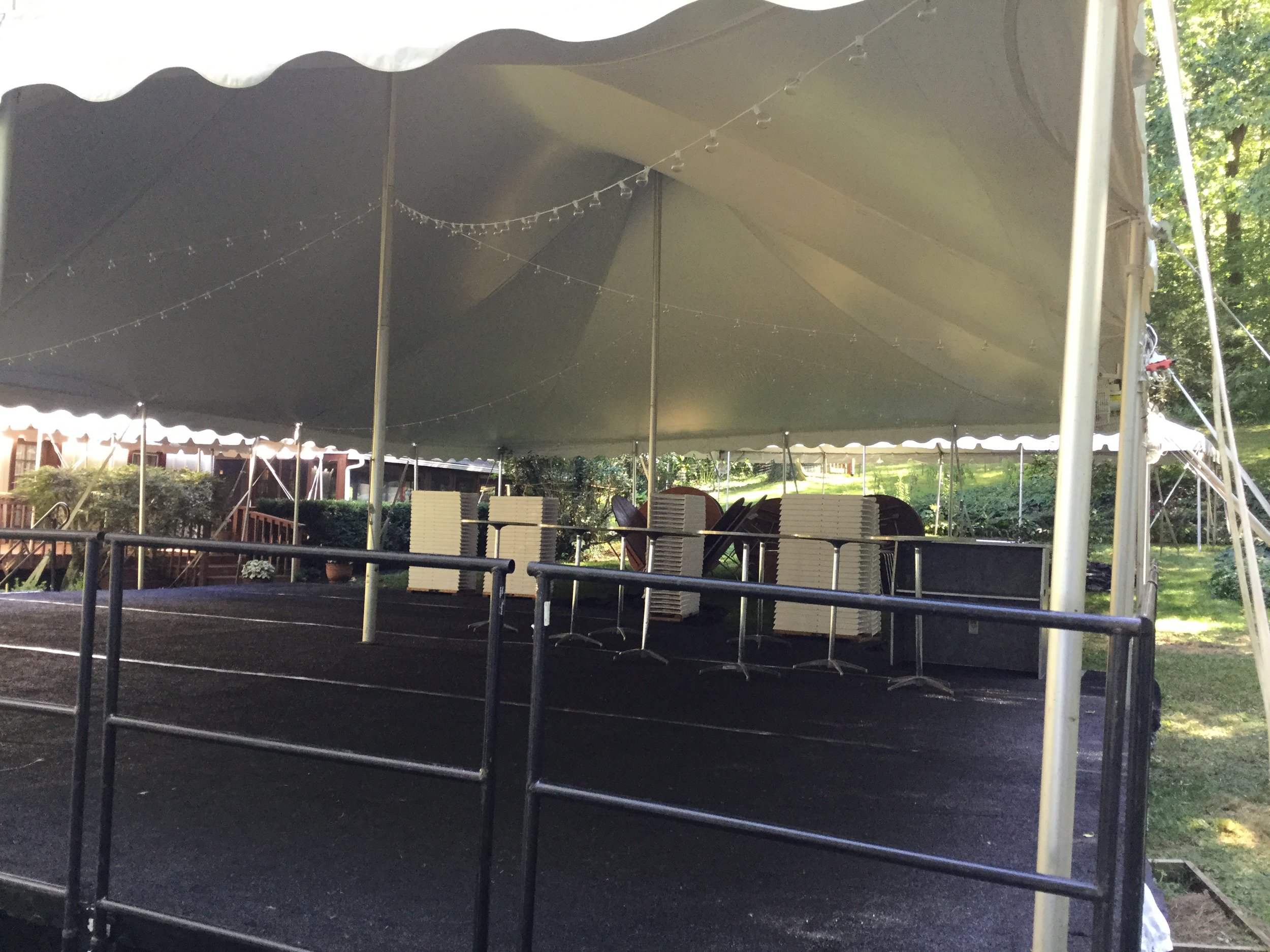 Tent on stage to level ground