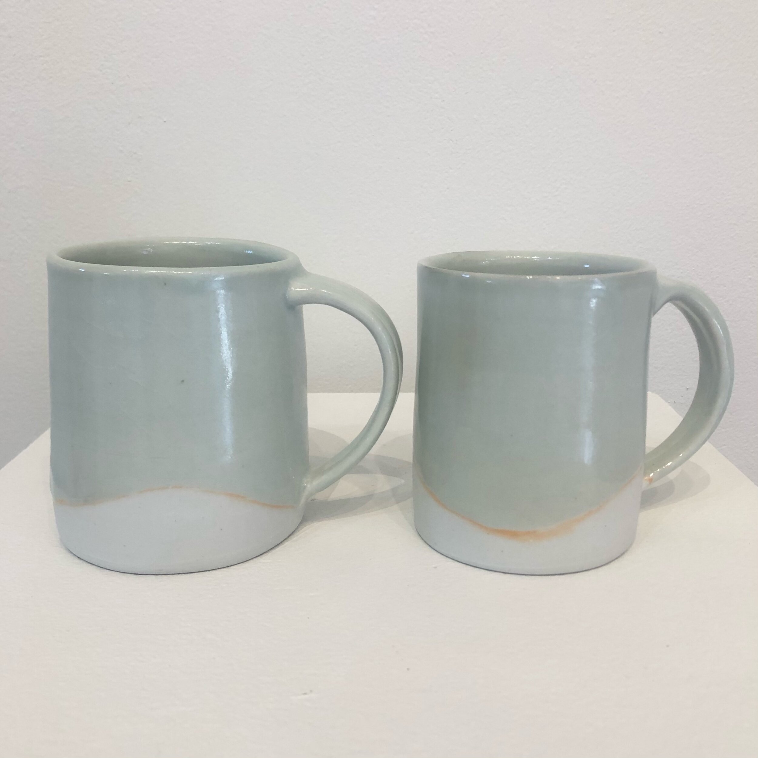  Porcelain mugs with ice trap glaze 4” tall SOLD 