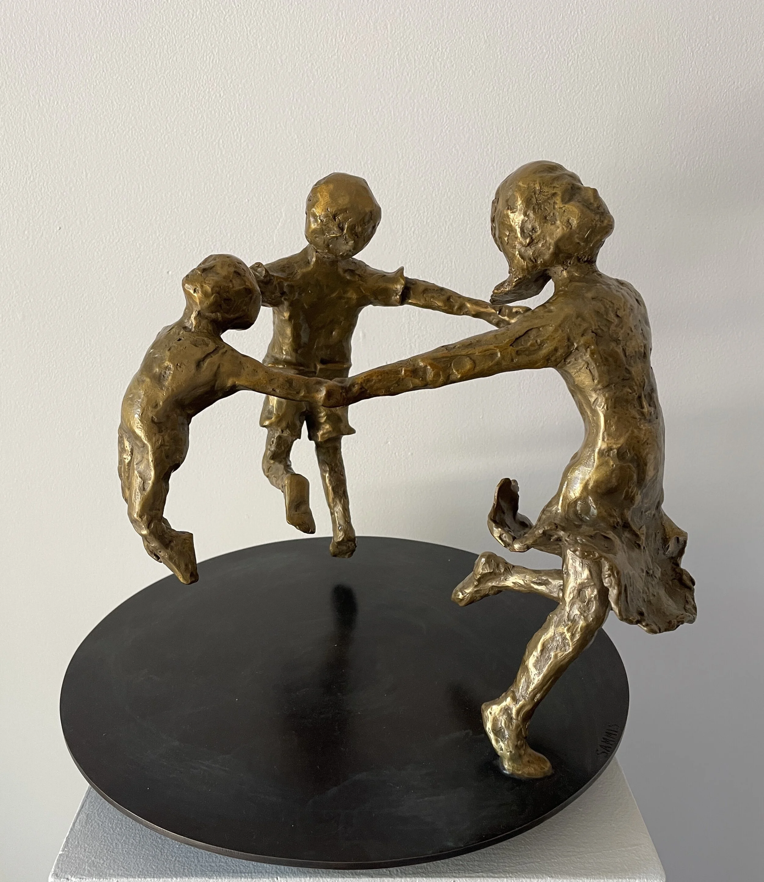 Three Dancing Children