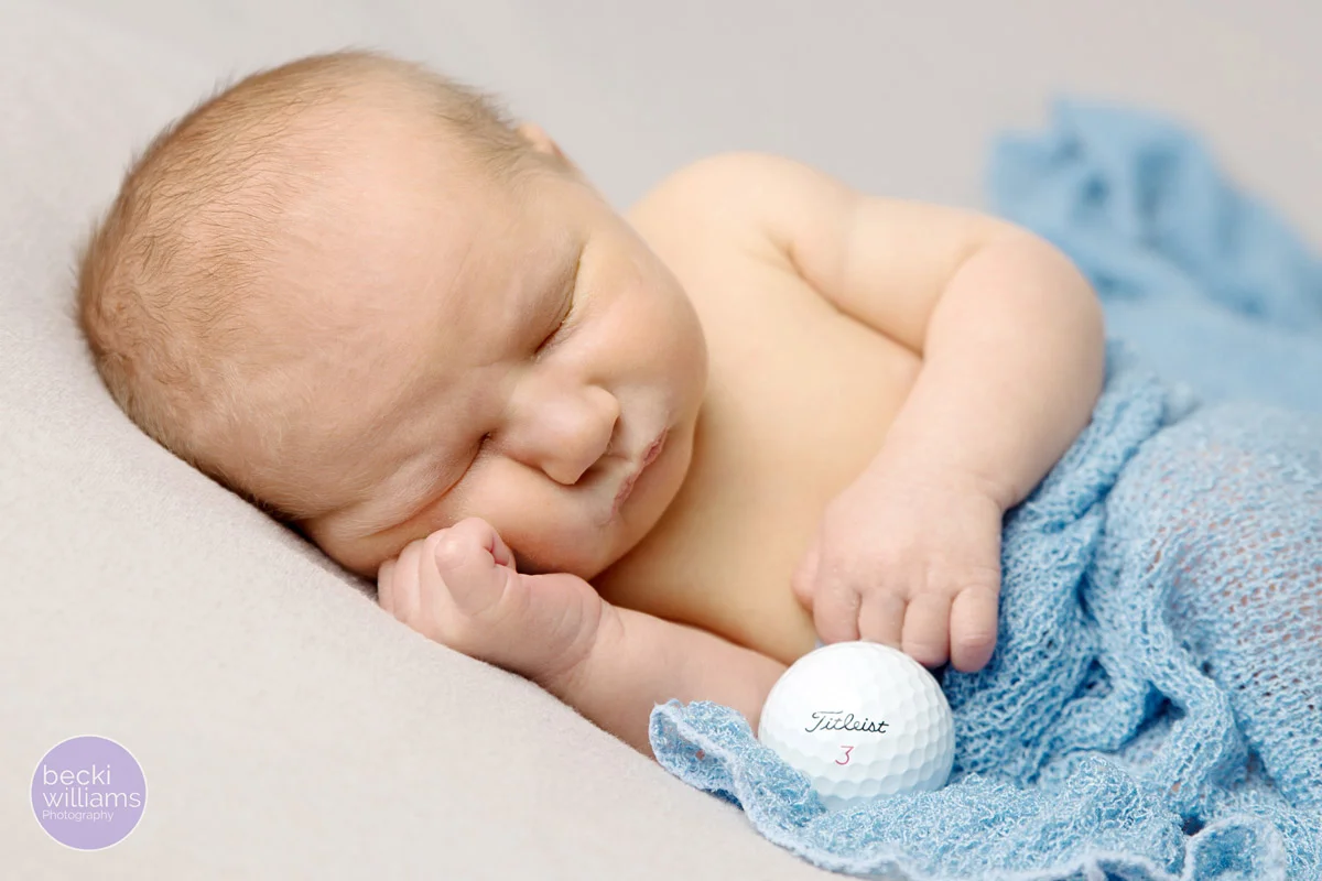 NEWBORN PHOTOS - blue wrap - golf ball - POSED