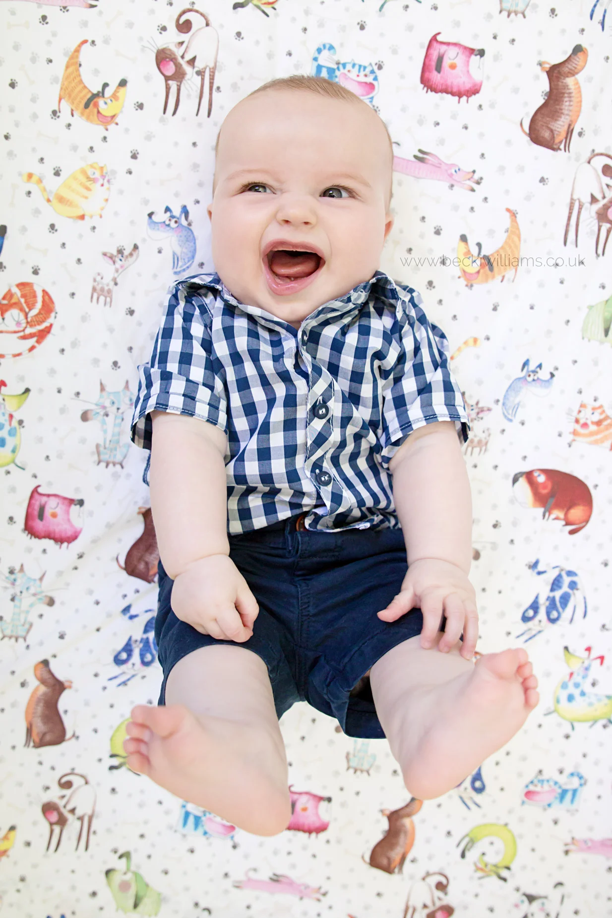 Baby-Photography-Hemel-Hempstead-Happy-In-Cot