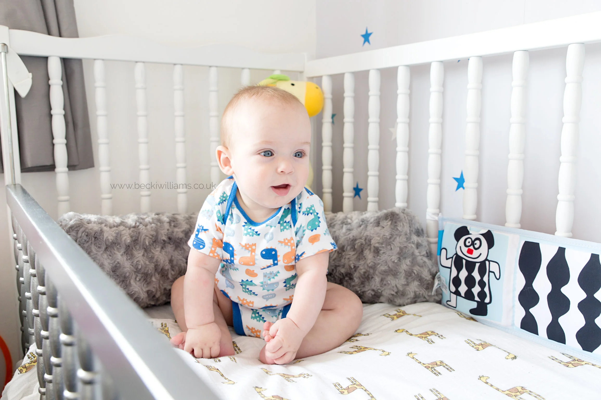 Baby-photography-hemel-hempstead-baby-sitting-in-cot