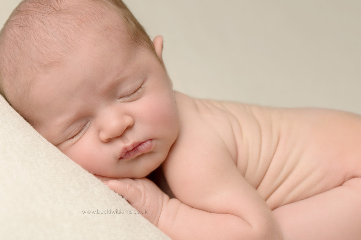 newborn-photo-shoot-hemel-hempstead-baby-girl-on-front.jpg