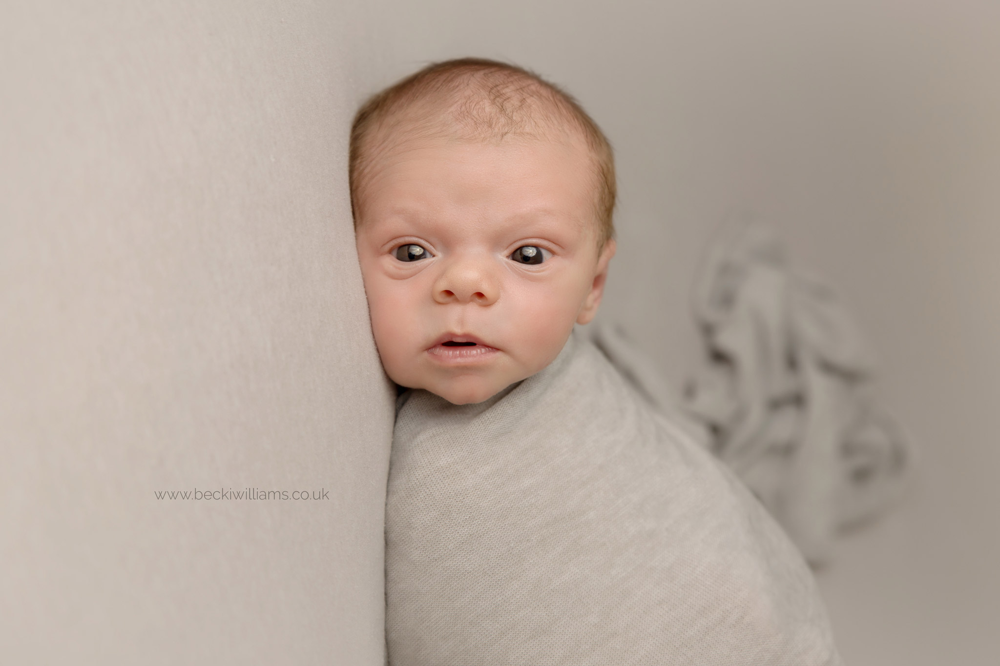 newborn-photography-hemel-hempstead-wrapped-grey-awake.jpg