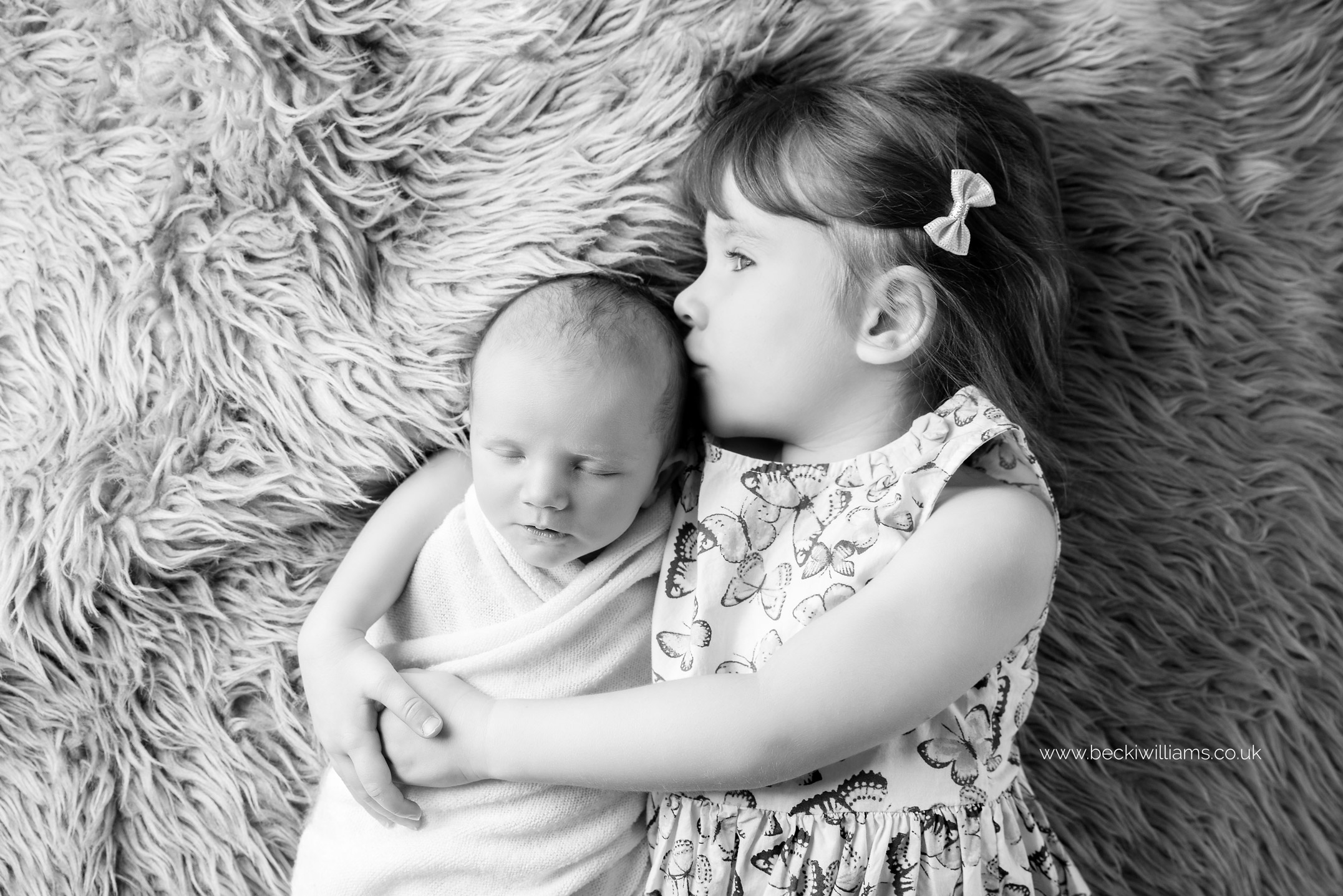 newborn-photography-berkhamsted-sibling-sister.jpg