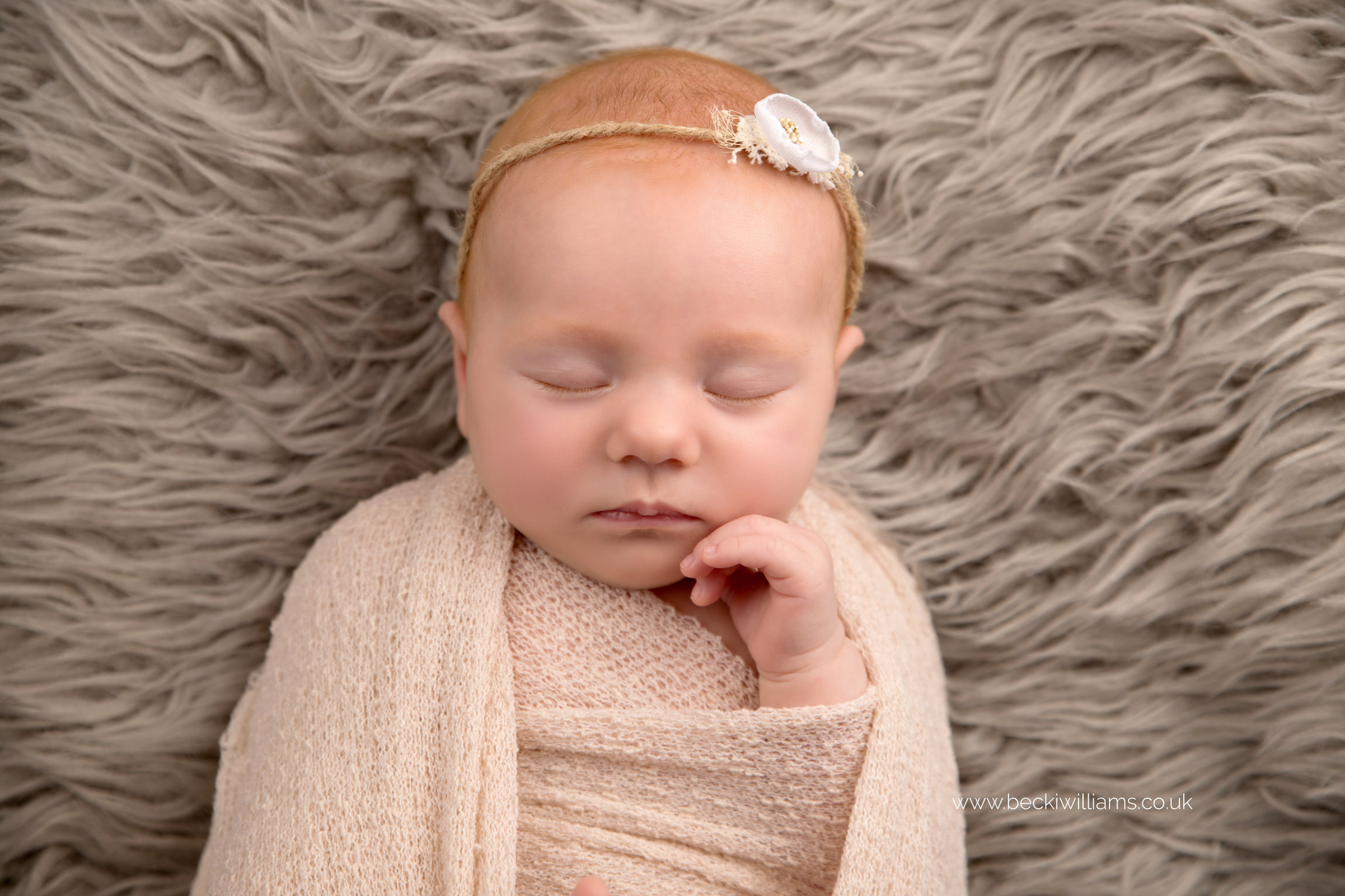 newborn-photographer-in-hertfordshire-wrapped-natural-asleep-neutrals.jpg