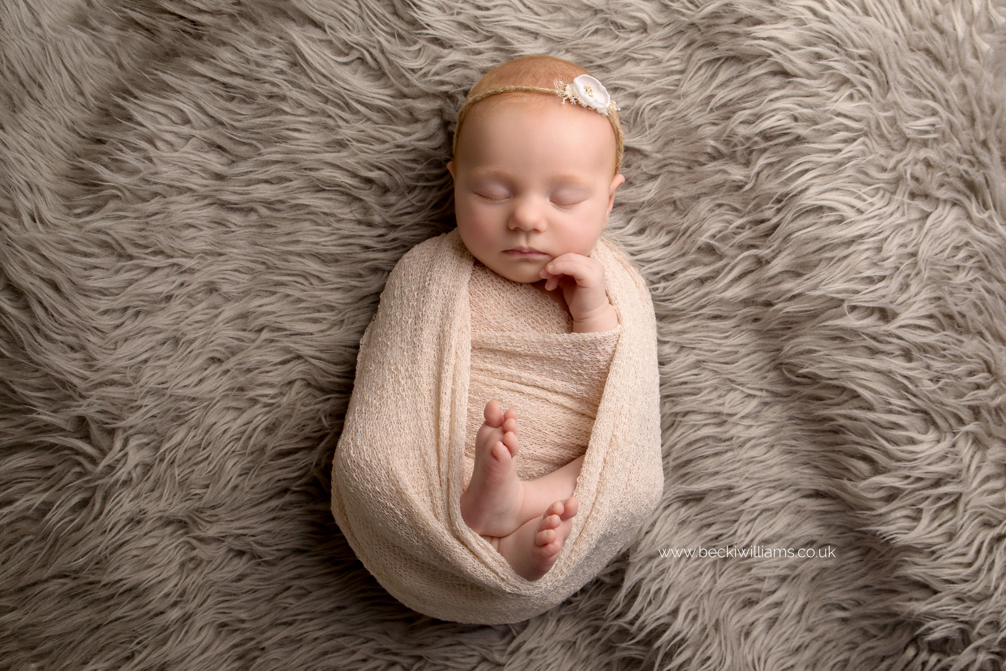 newborn-photographer-in-hertfordshire-wrapped-natural-asleep-girl-ginger.jpg