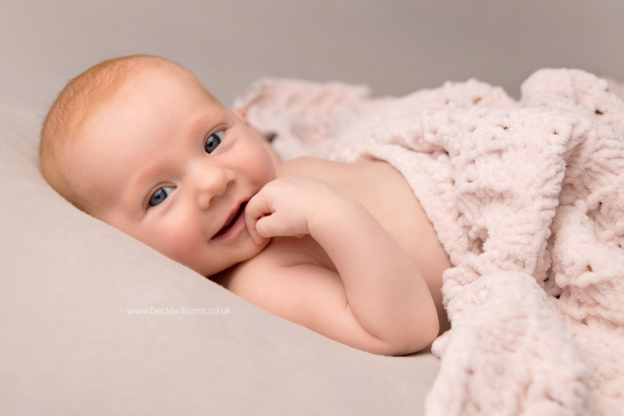 newborn-photographer-in-hertfordshire-2-month-old-girl-red-head.jpg