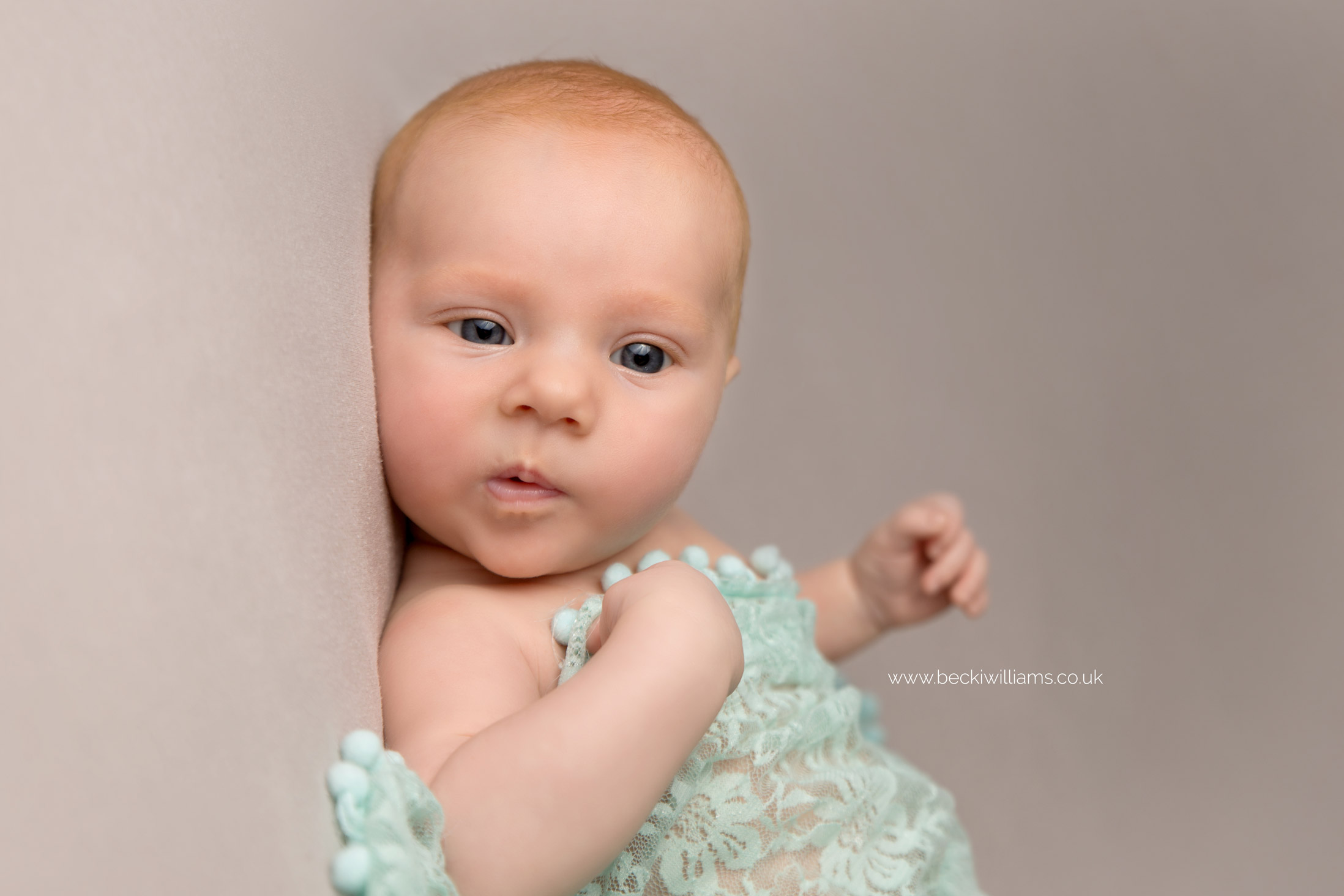 newborn-photographer-in-hertfordshire-funny-relaxed-natural-green.jpg