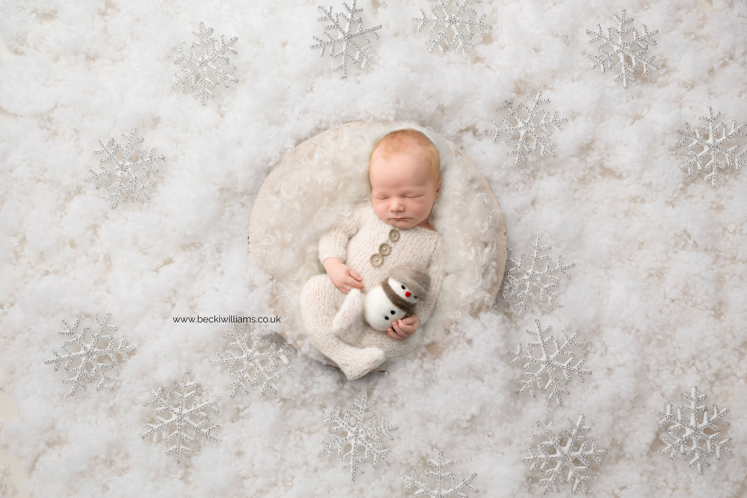 newborn-boy-portraits-hemel-hempstead-christmas-digital-background-snow-flake.jpg