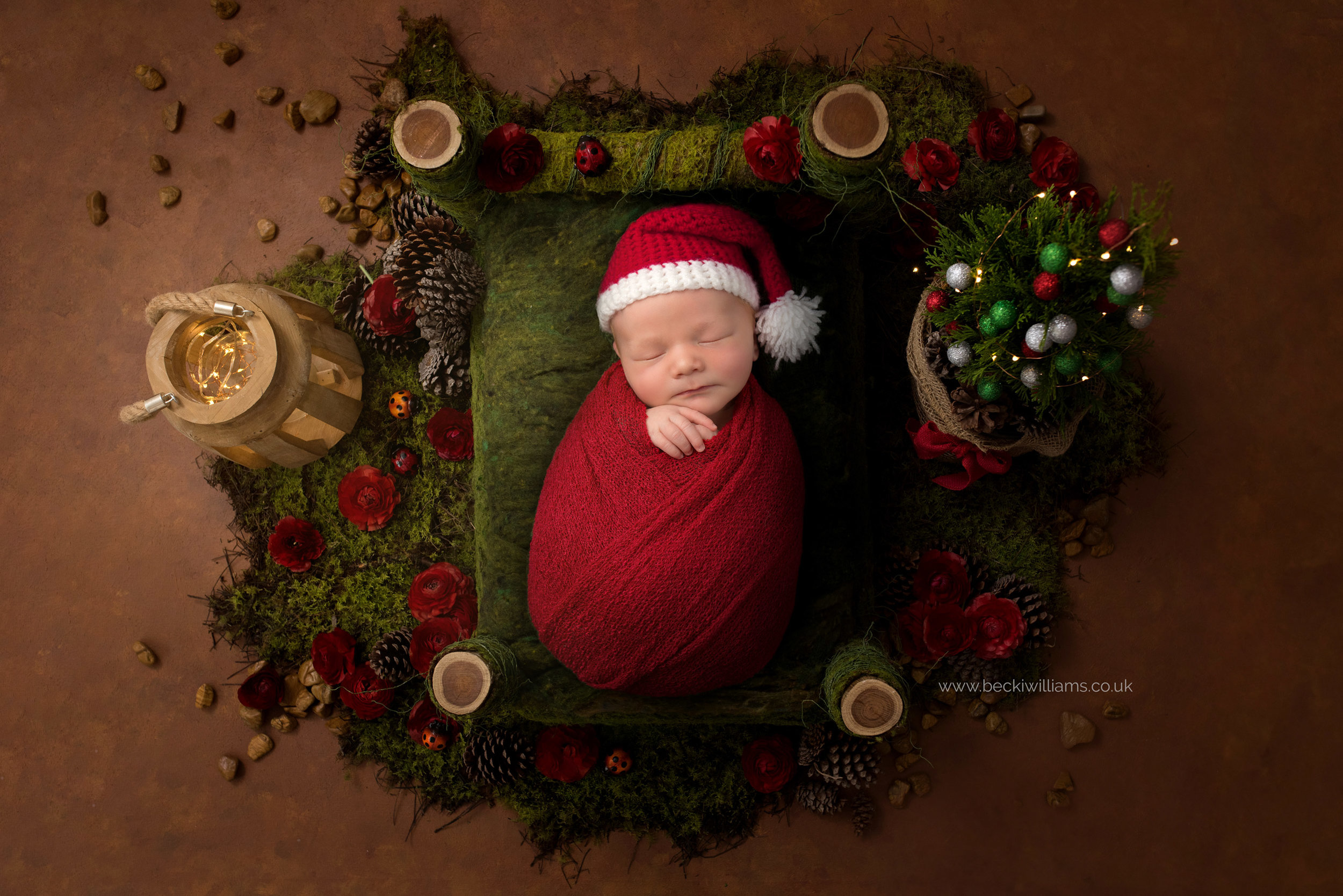 newborn-boy-portraits-hemel-hempstead-christmas-digital-background-santa-bed.jpg