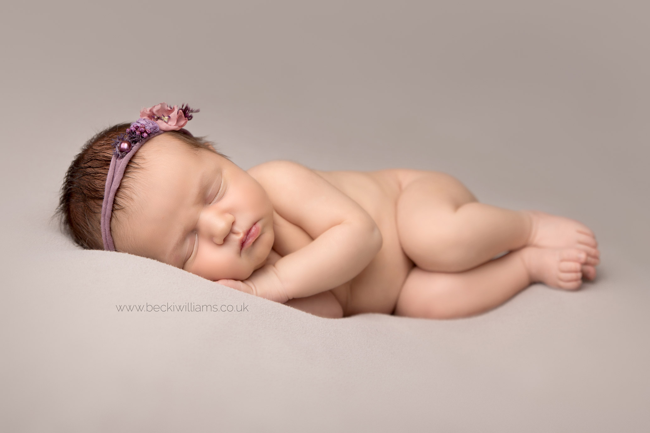newborn-girl-portraits-hemel-hempstead-girly-asleep-curled-up.jpg