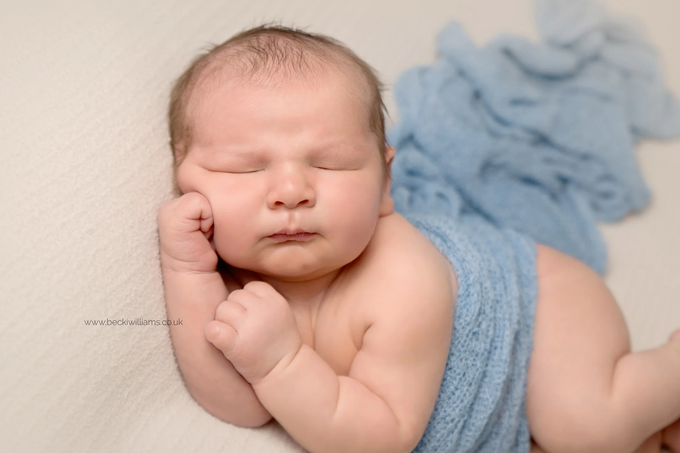 Newborn-boy-portraits-blue-asleep.jpg