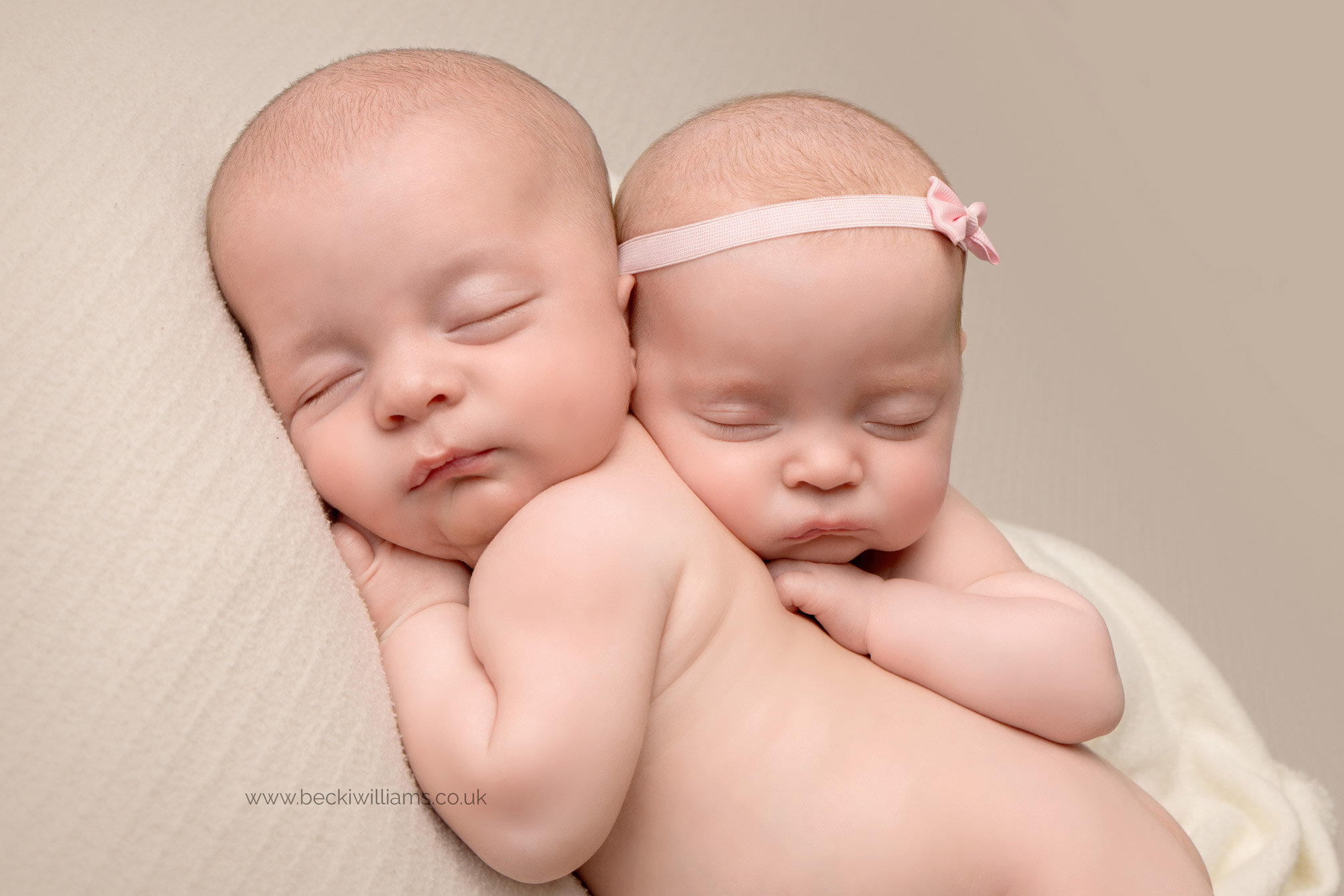 twin-newborn-photography-hemel-hempstead-cuddle-brother-sister.jpg