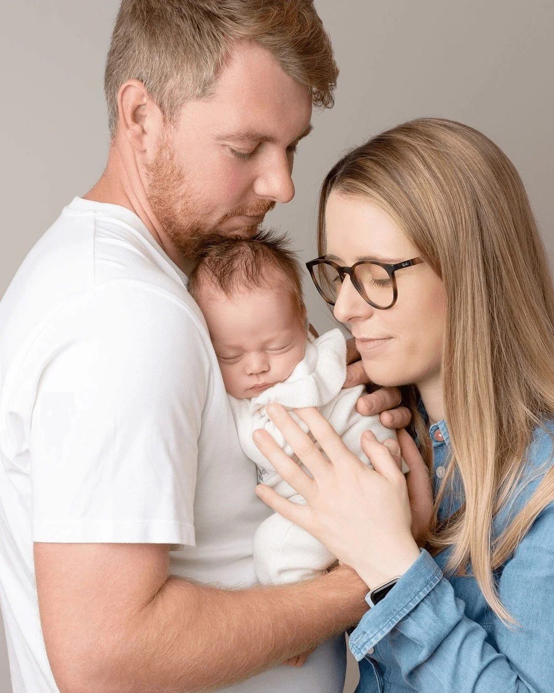 Do you HAVE to have family photos at your newborn photo shoot?  No. 
But should you seriously consider it? Absolutely.

Even if you don't want them for yourself, get them for your baby to look back on when they're older.  There are hardly any photos 