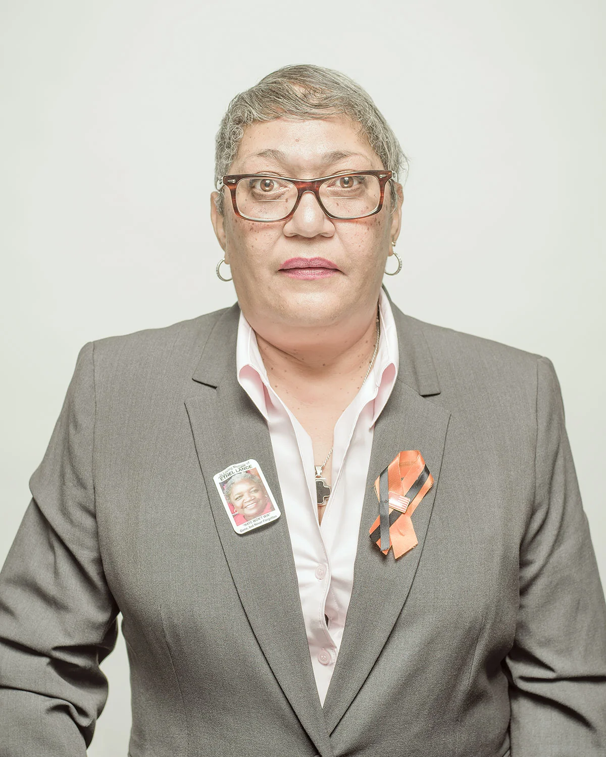 Survived By. Family members of Americans killed by gun violence. Rev. Sharon Risher, daughter of Ethel Lance, 70, and cousin to Susie Jackson, 87, and Tywanza Sanders, 26.