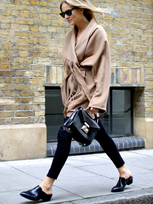 Flat mules: Mules are the “it” shoe this season and as easy to wear as your household slippers! Look for simple styles in basic colors for an effortless and elegant touch.