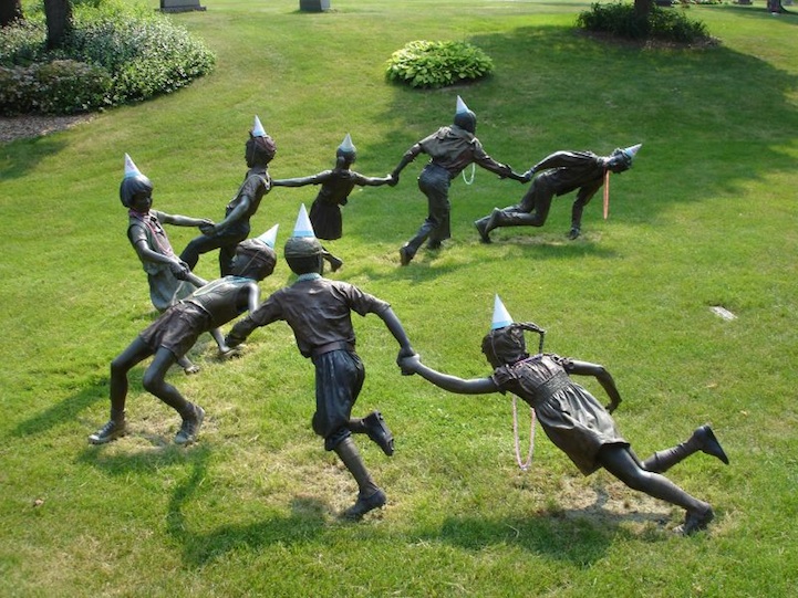  This grouping of sculptures, by J. Seward Johnson , bring back memories of childhood days, and is one of the many focal points in the cemetery. Gets a bit creepy when anonymous puts party hats and beads on them.