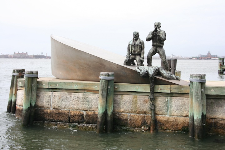 The memorial, designed by artist Marisol, was based on a true event during World War II, in which a Nazi U-boat attacked an American merchant marine vessel. While the marines held on to their sinking vessel, the Nazis photographed the victims, then left. The memorial is directly inspired by one of those photographs.