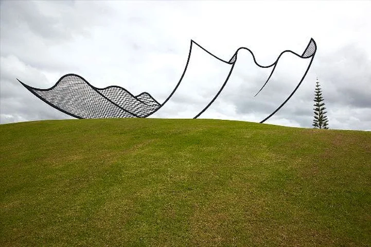 Though the jury's still out as to whether this sculpture by Neil Dawson is in fact an optical illusion sculpture or a hoax, we're going with the former. The sculpture almost makes us feel as if we're living in a cartoon world.