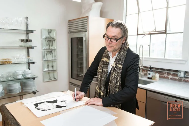 David Downton signing his illustration of Carmen Dell'orefice. Photo: Drew Altizer. Photographer Avi Mandhavi, Director of Photography Pierre Rieu, Lifestyle contributor JOLIEGAZETTE Anzor Makharadze, Founder JOLIEGAZETTE, Juliet Belkin. Photo: Drew Altizer