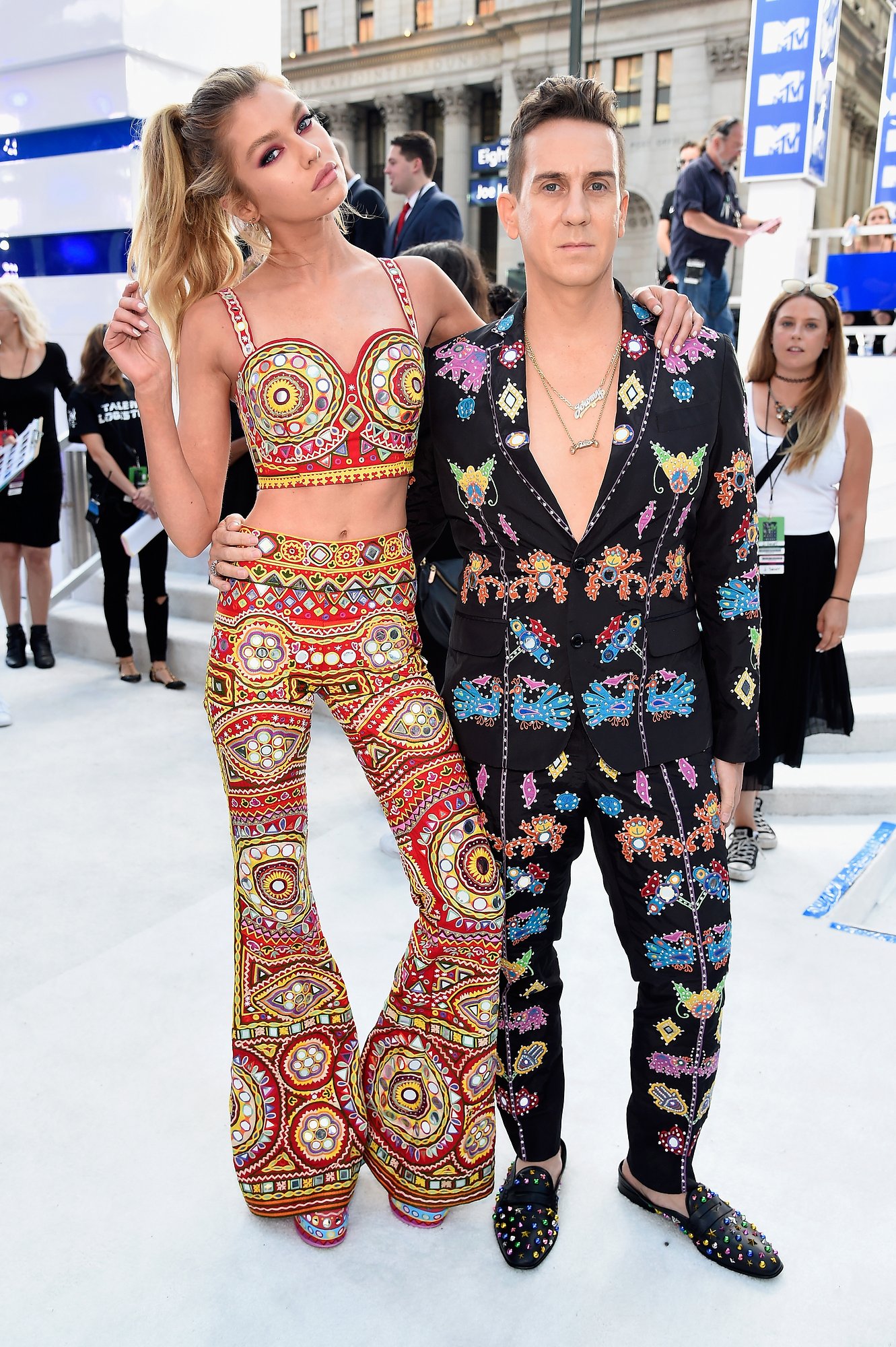 STELLA MAXWELL AND JEREMY SCOOT BOTH IN MOSCHINO
