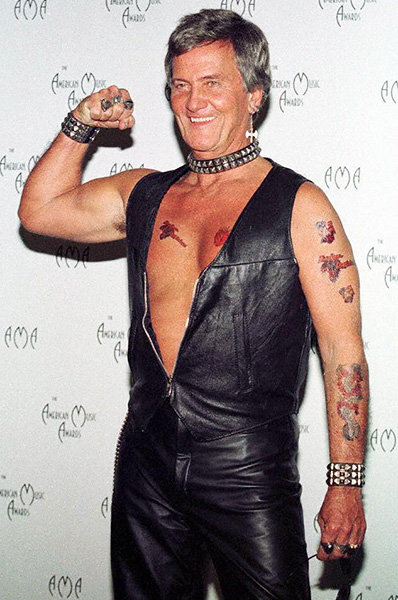 Pat Boone in 1997 Pat Boone donned a surprising leather look at the 1997 AMAs he promoted his metal cover album.