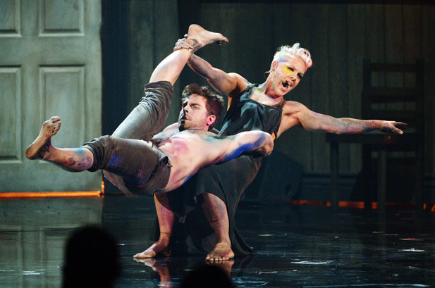 Pink in 2012 Pink shows off her acrobatic skills during her performance at the AMAs in 2012.