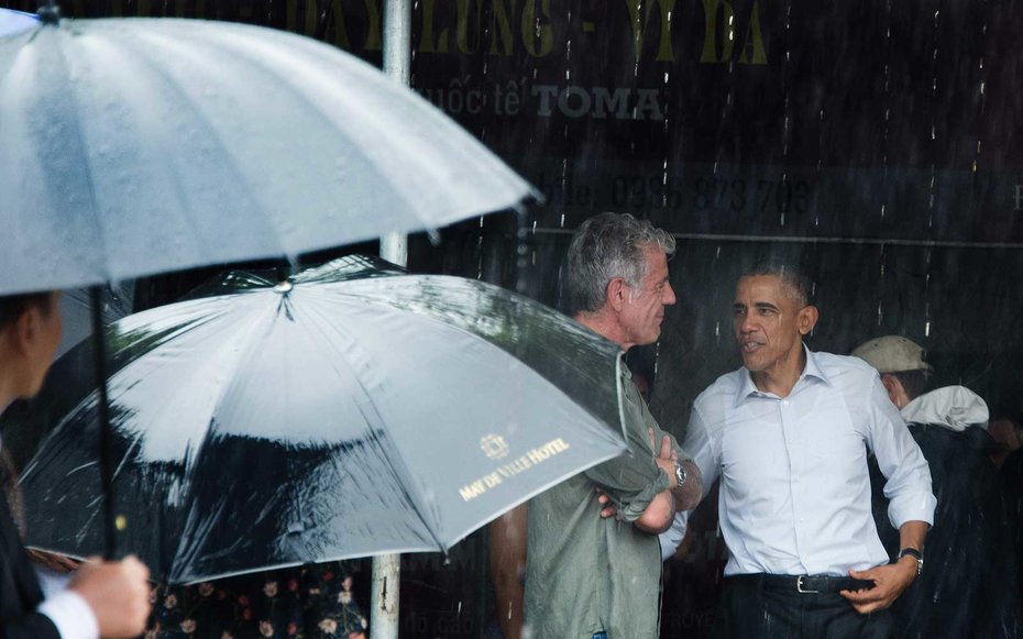 Hanoi, Vietnam Obama escapes the rain with Anthony Bourdain after meeting for lunch in Hanoi.