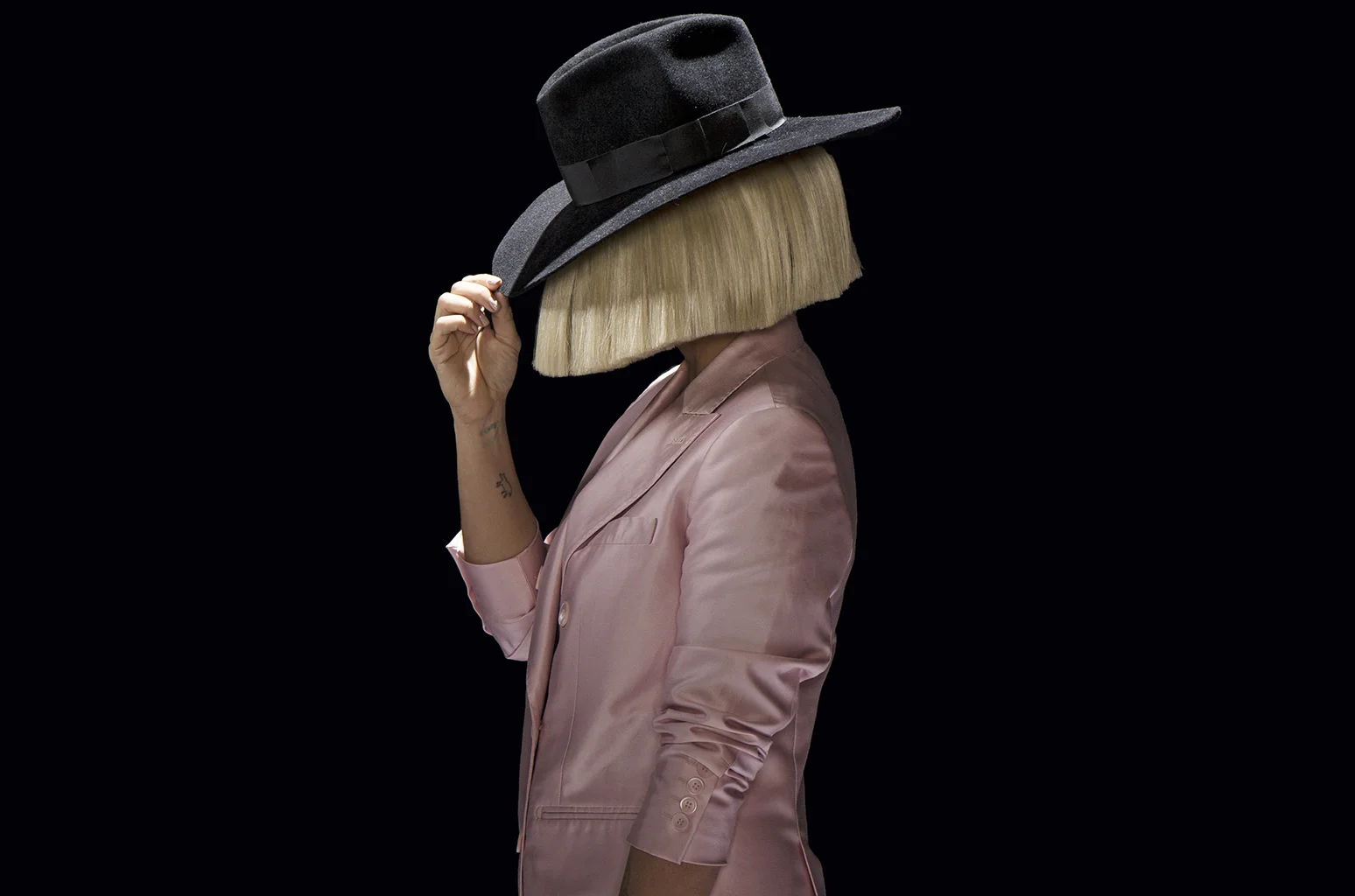 SIA UNMASKED